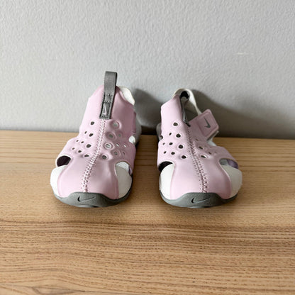 Nike  / Light pink slip on shoes / US9