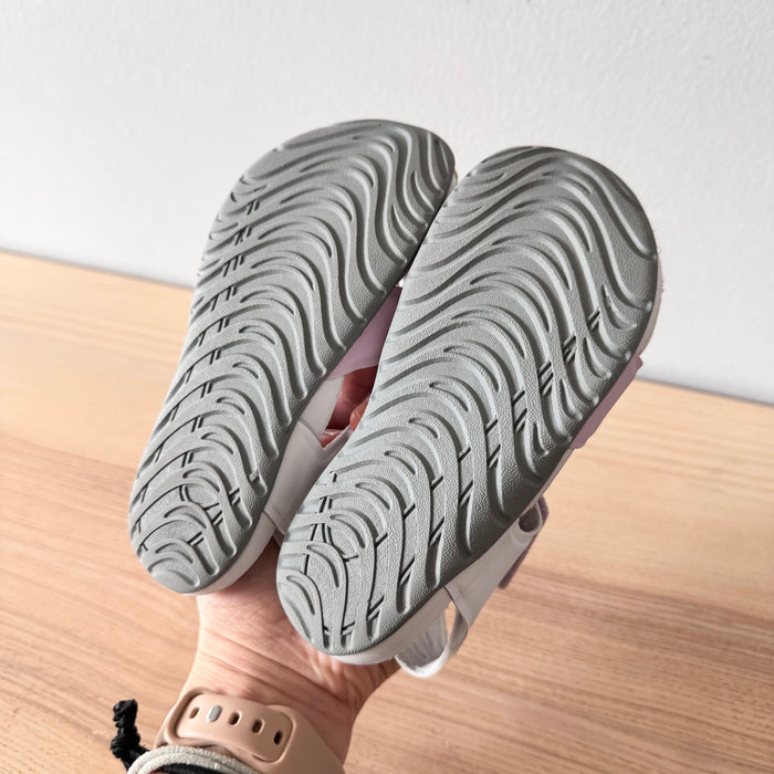 Nike  / Light pink slip on shoes / US9