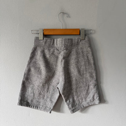 The Beginning / Light grey crew shorts / 6Y